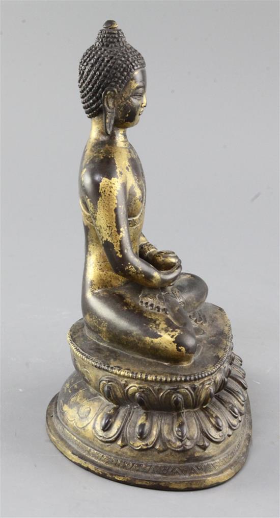 A Chinese gilt bronze seated figure of Buddha Shakyamuni, height 23cm
